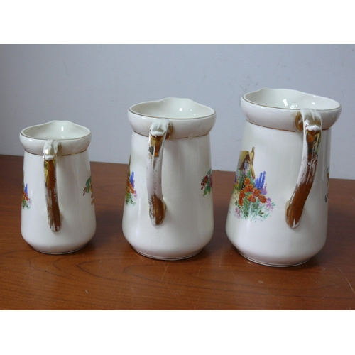 273 - Falcon Ware 'A Bit of Old England' Jug Set, 
Small - 14.5cm 
Medium- 17cm 
Large- 19cm