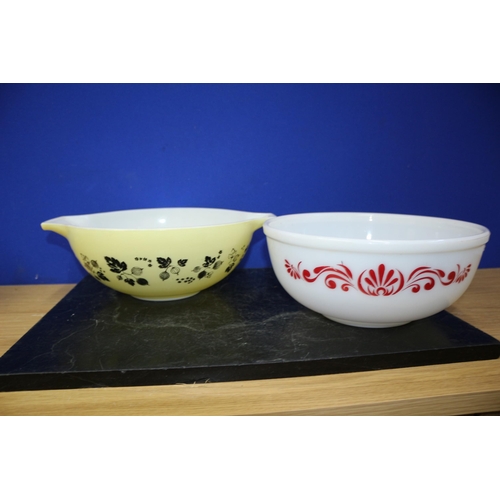 383 - 2 Pyrex Dishes, 1 Gooseberry Pattern, Largest is 33cm handle to handle