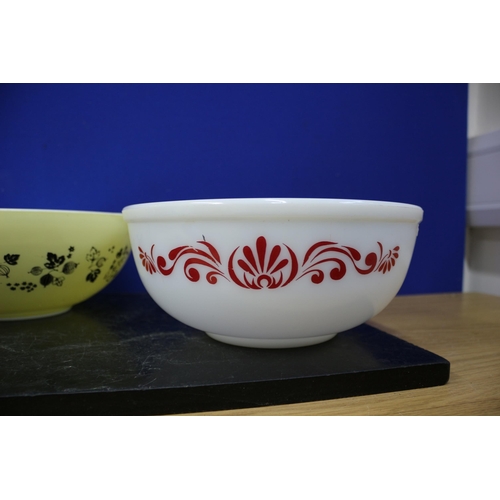 383 - 2 Pyrex Dishes, 1 Gooseberry Pattern, Largest is 33cm handle to handle