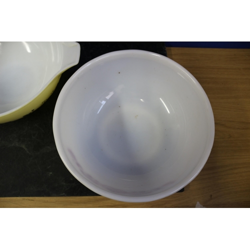 383 - 2 Pyrex Dishes, 1 Gooseberry Pattern, Largest is 33cm handle to handle