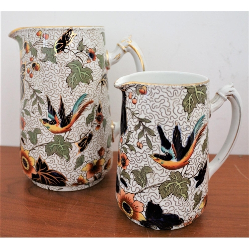 616 - Believed to be a Vintage Keeling & Co Pair of Highly Decorative Jugs with Bird and Floral Design