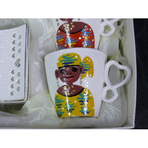 64 - Boxed hand painted Senegal Coffee Sr6