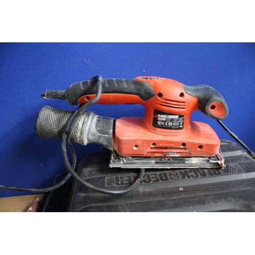 132 - Cased Black and Decker KA32OE Sander, Powers up