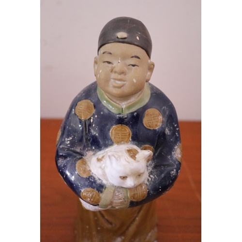 159 - Chinese Mud Man Male Holding a Cat Figure, 24cm High