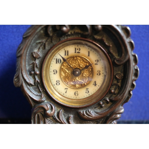 222 - Aged Metal Ornate British United Clock Company Clock, 10cm Tall