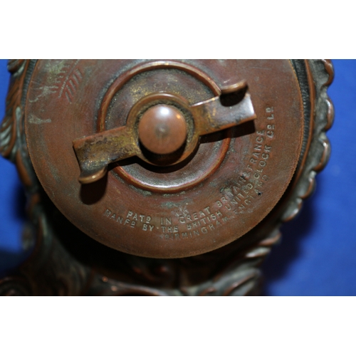 222 - Aged Metal Ornate British United Clock Company Clock, 10cm Tall