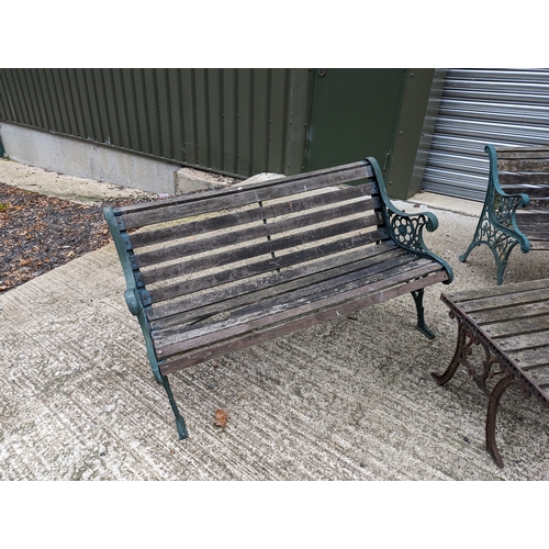 104 - 2 Aged Wooden Garden Benches & Table with Wrought Iron Scroll Ends