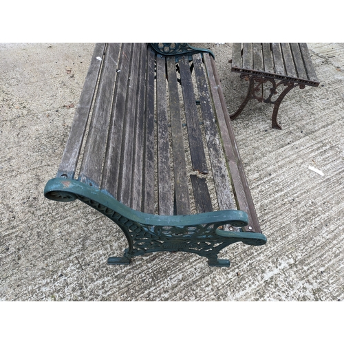 104 - 2 Aged Wooden Garden Benches & Table with Wrought Iron Scroll Ends