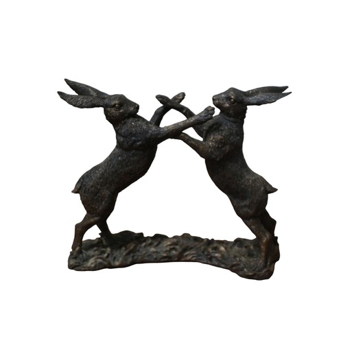 34 - Pair of Cotemporary Bronzed Resin Hares Boxing, 22cm long x 19cm tall