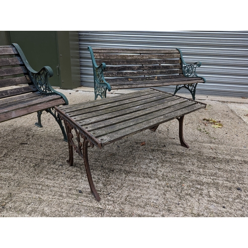 279 - 2 Aged Wooden Garden Benches & Table with Wrought Iron Scroll Ends