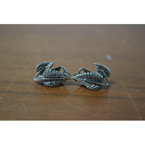 388 - White Metal Fern Style Earrings