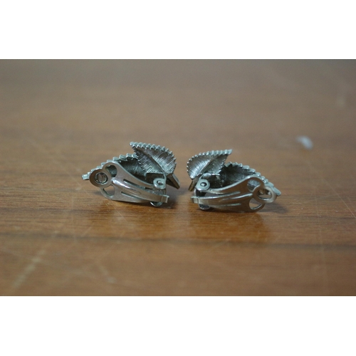 388 - White Metal Fern Style Earrings