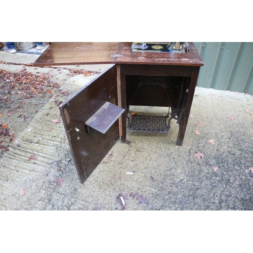 17 - Vintage Singer sewing machine with cabinet