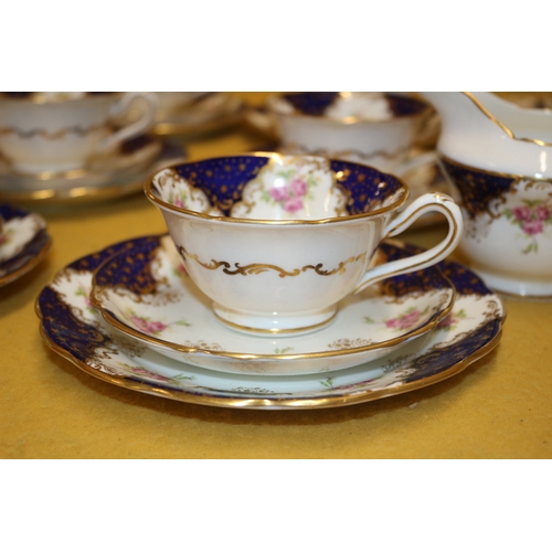 34 - 22 Pieces of Queen Anne 'Caprice' China Tea Cups with Sandwich Plates, Server Dish and 2 Bowls plus ... 