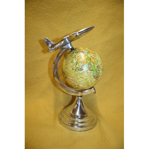 44 - Boxed Aluminium Aeroplane Flying over Globe - 30Cm Tall