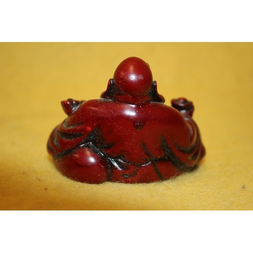 251 - Small Laughing Resin Red Buddha - 4.5cm Tall