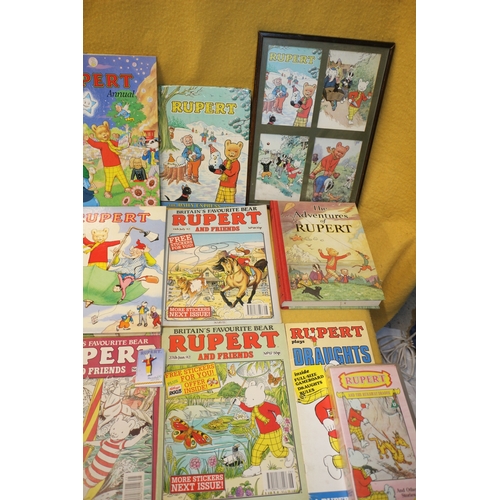 13 - Large Bundle of Rupert Bear Annuals, Comics, VHS Tape, Pin Badge & Other