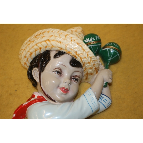 106 - Mid Century Mexican Boy & Girl Wall Hanging Busts