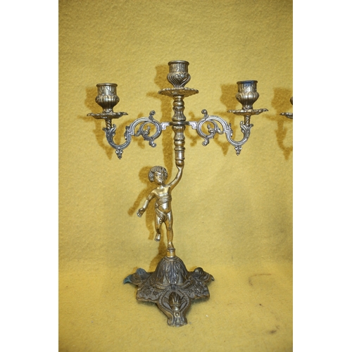 175 - Pair of Metal Cherub, 3 Holder Candle Sticks 35cm Tall