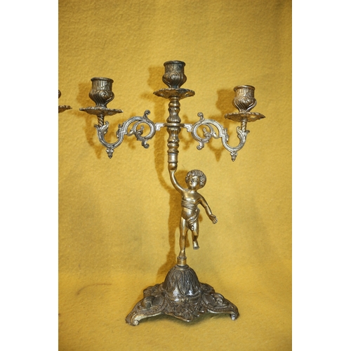 175 - Pair of Metal Cherub, 3 Holder Candle Sticks 35cm Tall