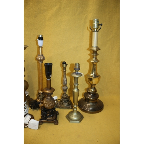 258 - 7 Brass/Copper/ Coloured Lamps, Tallest is 56cm