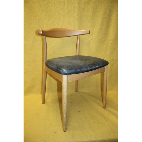 262 - Danish Design Cow Horn Chair