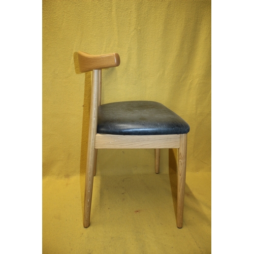 262 - Danish Design Cow Horn Chair