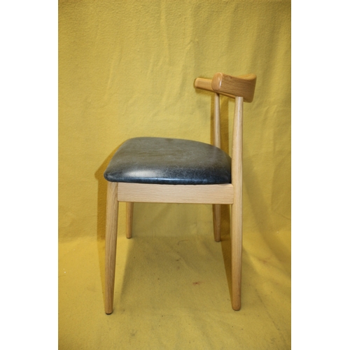 262 - Danish Design Cow Horn Chair