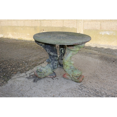 31 - Concrete Fish Leg Table, 1 Leg has an older repair,  66 cm diameter top