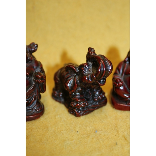 48 - 3 Small Red Resin Chinese Figures Including Elephant and Buddhas