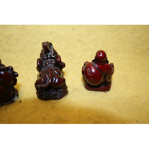 48 - 3 Small Red Resin Chinese Figures Including Elephant and Buddhas