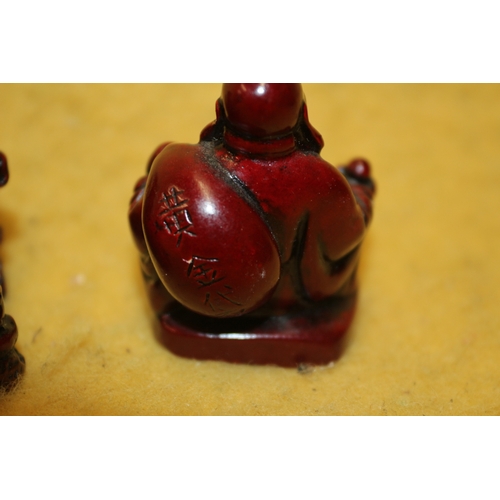 48 - 3 Small Red Resin Chinese Figures Including Elephant and Buddhas