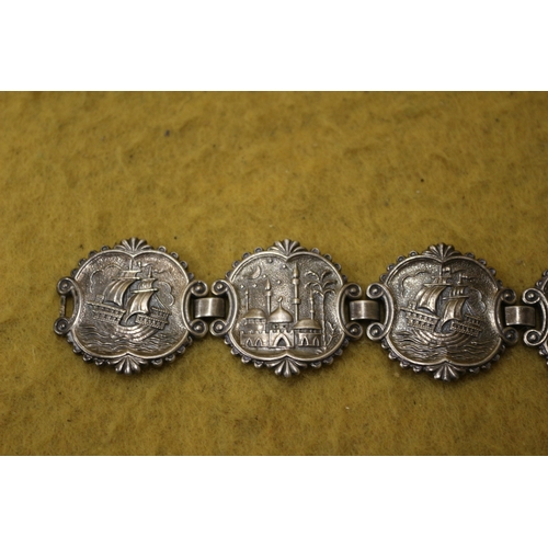 100 - White Metal Bracelet with 6 Images