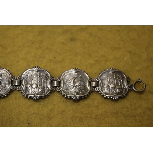 100 - White Metal Bracelet with 6 Images