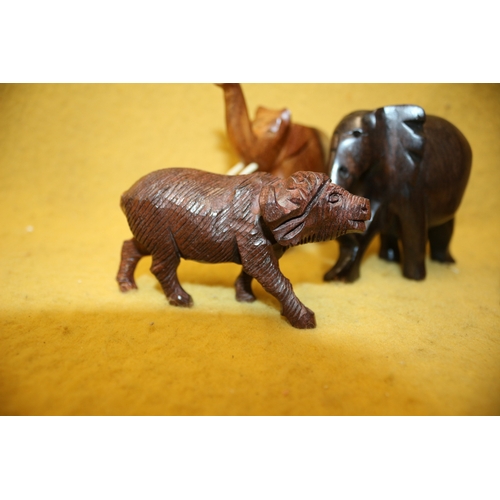 96 - 7 Carved Animals