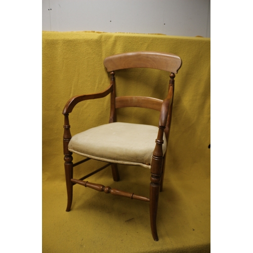 98 - Aged Elbow Chair