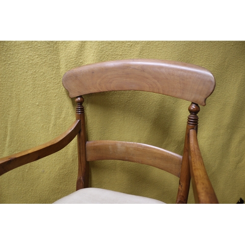 98 - Aged Elbow Chair