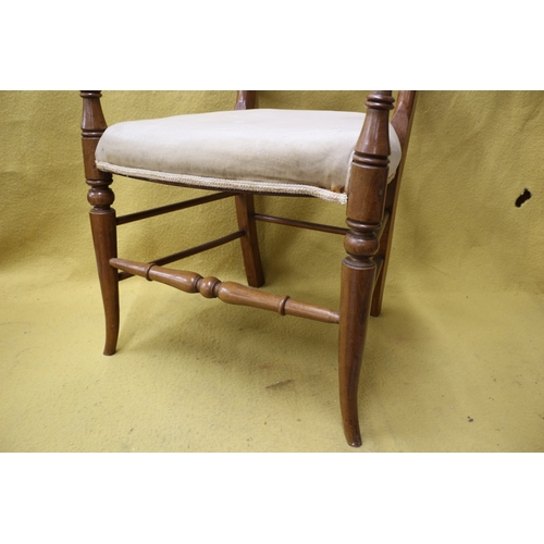 98 - Aged Elbow Chair