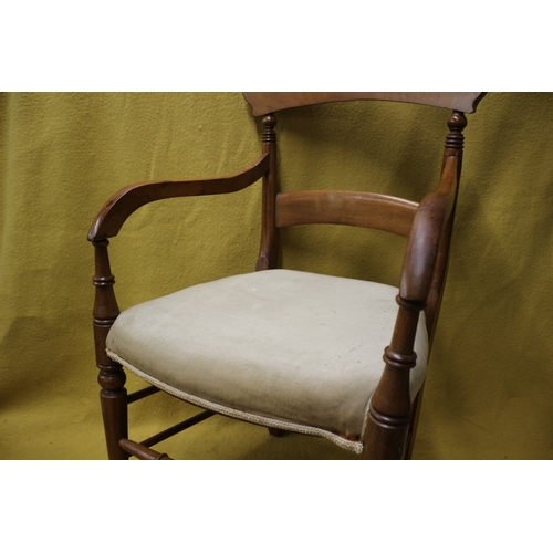 96 - Aged Elbow Chair