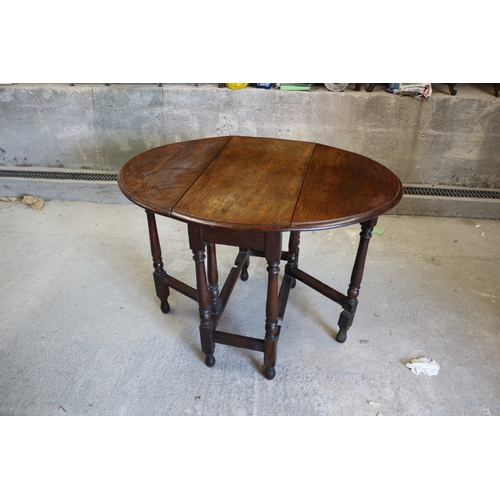131 - Early 20th Century Oak Drop Leaf Table