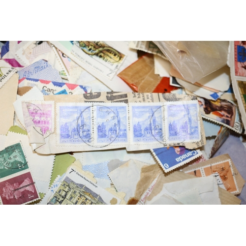 239 - Large Bundle of World Stamps in Tin