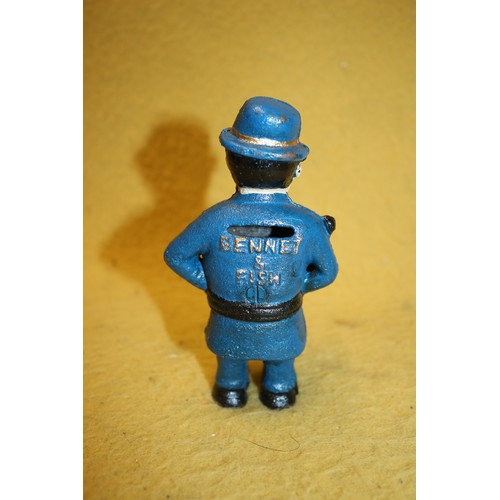 91 - Cast Iron Policeman Bennet & Fish Money Box, 14cm Tall