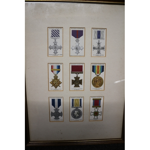 131 - Framed Collection of John Player Cigarette Cards Detailing Medals - 27 x 37cm