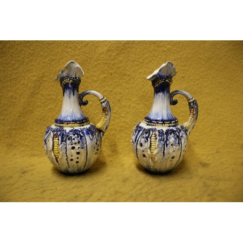 32 - 2 x Majolica Style Jugs with Holes