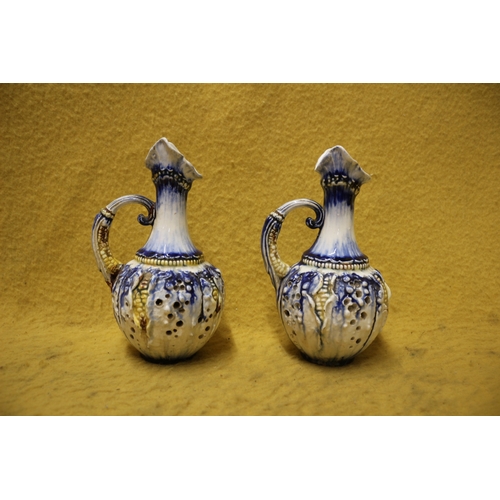 32 - 2 x Majolica Style Jugs with Holes