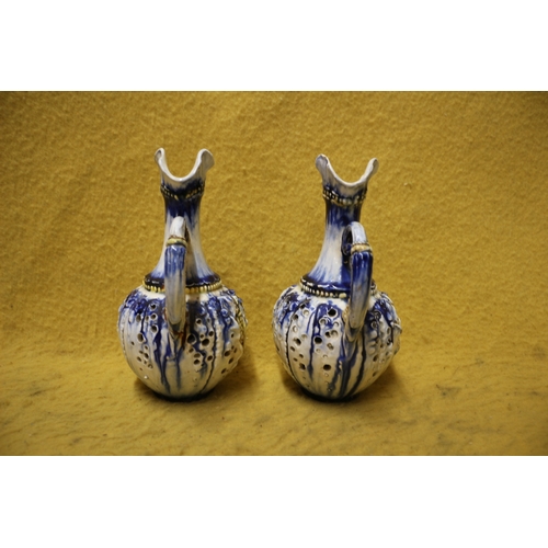 32 - 2 x Majolica Style Jugs with Holes