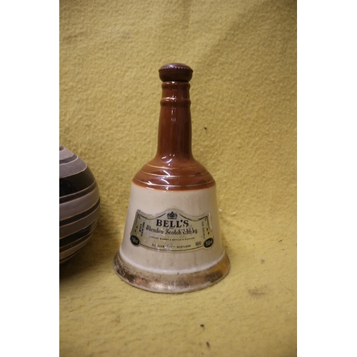 33 - Tall Neck Bells Decanter plus a Pair of Spiral Pattern Vases and a White Decorated Lidded Pot