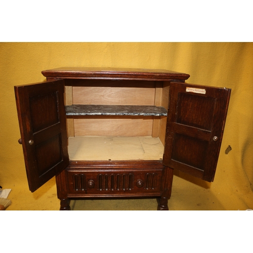 37 - Aged Priory Style Cabinet with Double Doors and Drawer Below - 69cm tall