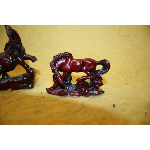 48 - Red Resin Elephant with Raised Trunk and Horse - Tallest 10cm