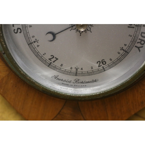 569 - Wooden cased Barometer - 25cm